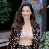 Actress Olivia Munn dons a floral suit and lilac bra as she attends the âPredatorâ photocall at Villamagna hotel in  Madrid, Spain. September 4, 2018 X17online.com USA ONLY
