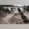 Abadoned cars stuck in flooded water on the freeway after a mudslide in Montecito, California, January 9, 2018