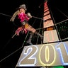 Evalena Worthington practices her New Year's Eve descent from the top of a sailing vessel's mast in Key West, Florida