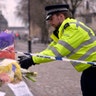 Floral tributes in Westminster the day after a terror attack, in London March 23, 2017. 