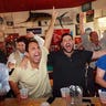 football fans in bar