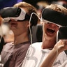 Attendees with virtual reality headsets have fun at the Gamescom fair Aug. 23, 2017