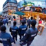 German police officers patrol over the Christmas market in Frankfurt, Germany.