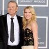 Glen Campbell, Kim Woolen, and Ashley Campbell arrive at the 54th annual Grammy Awards in Los Angeles, Feb. 12, 2012. 