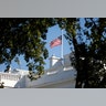 The U.S. flag flies at half-staff in the wake of a mass shooting