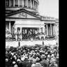 People stand in the rain for the inauguration of Herbert C. Hoover as he is sworn in as the 31st president of the United States in front of the Capitol in Washington, D.C. on March 4, 1929.