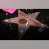 Candles are placed on Hugh Hefner's star at the Hollywood Walk of Fame