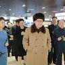 North Korea leader Kim Jong-Un, with his wife Ri Sol-Ju, gives field guidance at the newly built Mirae Shop and Health Complex