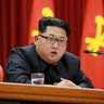 Kim Jong Un speaks during a ceremony to award party and state commendations