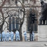 Police forensic officers work in Parliament Square in London, March 23, 2017.