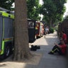 Police, firemen and emergency vehicles still fill the streets a week after the London fire