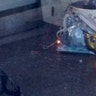 A fire on a plastic bucket burns at southwest London subway station after an explosion.