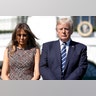 President Donald Trump and first lady Melania Trump stand during a moment of silence to remember the victims