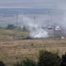 Fires burn at wreckage site