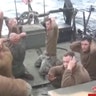 Iran releases photos and videos of the capture of 10 US Navy sailors in Iranian waters.