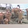 Iran releases photos of the detainment of 10 US Navy sailors in Iranian waters