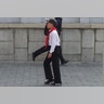 Kid walking in Pyongyang, North Korea