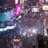 Revelers celebrate the new year as confetti flies over New York's Times Square as seen from the Marriott Marquis, Sunday, Jan. 1, 2017.