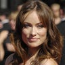 Actress Olivia Wilde arrives at the 59th Primetime Emmy Awards Sunday, Sept. 16, 2007, at the Shrine Auditorium in Los Angeles.   (AP Photo/Chris Pizzello) 