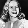 FILE - In this Dec. 26, 1945, file photo, actress Peggy Cummins, 20, smiles in Superior Court, in Los Angeles, after her contract with Twentieth Century-Fox Studio had been approved. Cummins, who gave an indelible performance as the lethal, beret-wearing robber in the noir classic 