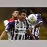 Three heads, one ball