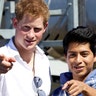 prince_harry_poses_with_local_boy