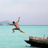 A sea gypsy spear fishing on the Andaman Sea.