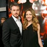 Actor Eric Dane (L) poses with actress Rebecca Gayheart at the premiere of 