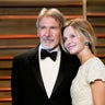 Actor Harrison Ford and his wife Calista Flockhart arrive at the 2014 Vanity Fair Oscars Party in West Hollywood, California March 2, 2014. REUTERS/Danny Moloshok (UNITED STATES  - Tags: ENTERTAINMENT)(OSCARS-PARTIES) - RTR3FYET