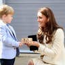 presented with a train for Prince George by actor Oliver Barker