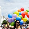 People participate in a Resist March that replaced the annual Pride Parade in Los Angeles, California