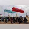 People march in Oceti Sakowin camp.