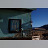 Our Lady of Guadalupe at a house near a newly built section of the U.S.-Mexico border fence in Ciudad Juarez, Mexico.