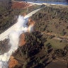 A damaged spillway with eroded hillside is seen in an aerial photo taken over the Oroville Dam in Oroville, California, 