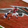 Atlanta Falcons tight end Austin Hooper (81) catches a pass for a touchdown against New England Patriots strong safety Patrick Chung (23) 