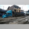 A truck is seen at the Central highway after a landslide and flood in Chosica, east of Lima.