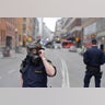 Police said a lorry ran over a crowd at Ahlens department story.