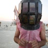 Derek Schoonmaker wears a helmet made of android phones at the annual Burning Man arts and music festival in Nevada, August 31