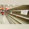 Shoppers encounter empty bread shelves ahead of the arrival of Hurricane Irma at a supermarket in Kissimmee, Florida, Friday