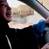 A Saudi Arabian woman drives a car as part of a campaign to defy Saudi Arabia's ban on women driving, in Riyadh, Saudi Arabia, June 17, 1998