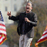 Jon Stewart performs