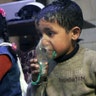 A child receives oxygen through respirators following a suspected poison gas attack in the rebel-held town of Douma, near Damascus, Syria