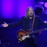 Musician Tom Petty performs on stage after being inducted during the 47th Songwriters Hall of Fame 