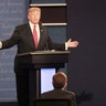Republican presidential nominee Donald Trump speaks to moderator Chris Wallace at the final debate