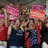 People cheer for President Donald Trump at a campaign-style rally at Big Sandy Superstore Arena in Huntington, W.Va., Aug. 3. 