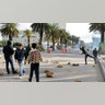 Tunisian youths throw stones at police forces