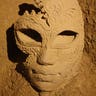 A medieval mask of sand.