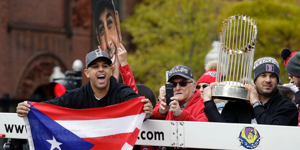 Alex Cora arrives in Puerto Rico as fans celebrate Red Sox win