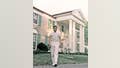 Elvis Presley pictured on the grounds of Graceland not long after the house was purchased.(Photo by Michael Ochs Archives/Getty Images)