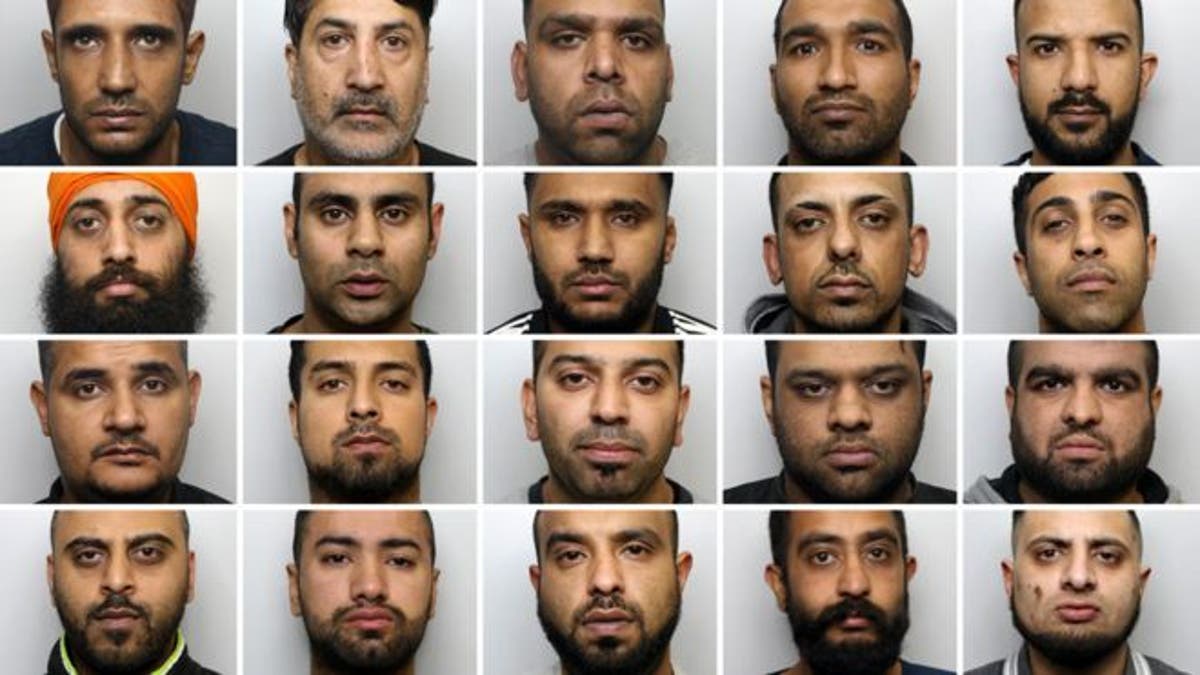 Twenty men, including ringleader Amere Singh Dhaliwal (first in the second row), were found guilty of raping and abusing more than a dozen teenager girls in the U.K.